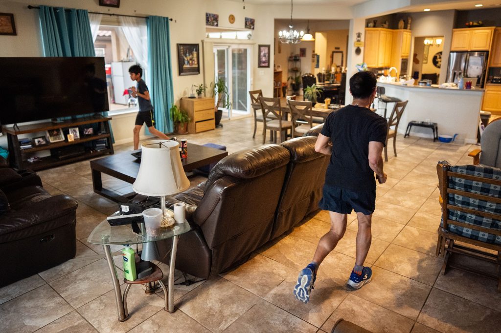 <strong>INDOOR COURSE</strong> — While Brian prefers to run outside, he occasionally runs a mile or two inside with his son, Evan. He bought a measuring wheel and discovered 38 laps inside his home was exactly one mile.